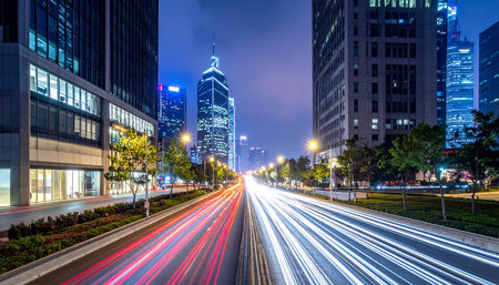 the light trails on the modern building background in shanghai chinaの素材