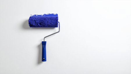 Paint roller on a white background. The concept of repair work.の素材