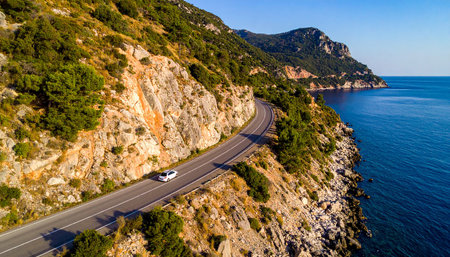 Aerial view of the road on the coast of Corsica, Franceの素材