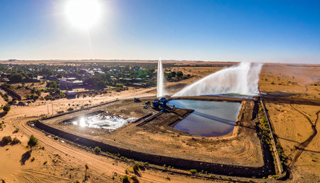 Aerial view of a fountain in the middle of the desert.の素材