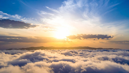 Sunset over the sea of clouds. Panoramic view.の素材