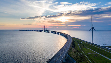 Aerial view of the bridge over the sea at sunset in summerの素材