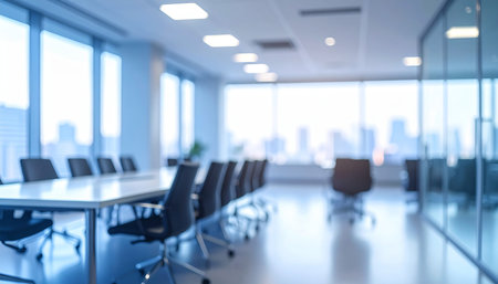 Blurred background of modern conference room with bright panoramic windowsの素材