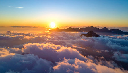 Sunrise over the clouds at Doi Pha Tang in Chiang Rai, Thailandの素材