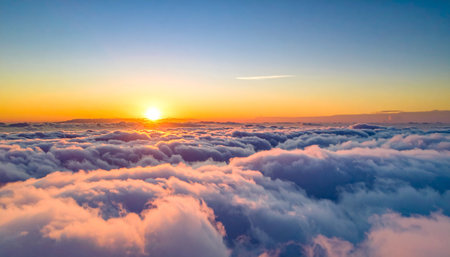 Beautiful sunset above the clouds. Panoramic aerial view.の素材