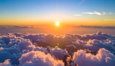 Aerial view of beautiful sunset above the clouds. Panoramic viewの素材