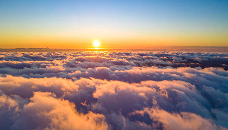 Aerial view of cloudscape at sunset. Beautiful nature background.の素材