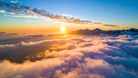 Aerial view of clouds and sky at sunset. Beautiful nature background.の素材