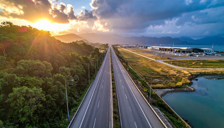 Aerial view of highway road at sunset, Hong Kong, Chinaの素材