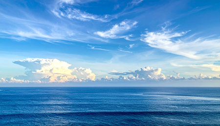 Blue sky with clouds over the sea. Panoramic view.の素材