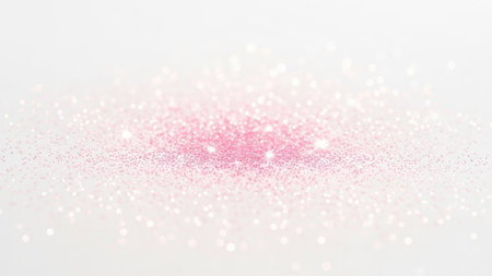 Pink glitter sparkle confetti on white background. Festive decoration.の素材