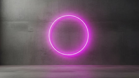 A single, perfectly circular pink neon light hovers in the center of a stark, minimalist space. The light is intensely bright and casts a soft glow on the surrounding environment. The background is a rough, textured concrete wall, showing imperfections and variations in its surface. The floor is also concrete, appearing slightly damp or reflective, adding to the moody atmosphere. The composition is simple and geometric, focusing on the contrast between the smooth, glowing neon circle and the...の素材