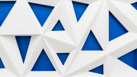 a striking geometric pattern composed of white triangular shapes arranged in a repeating, interlocking The sharp, angular forms create a sense of depth and dimension, with negative spaces revealing a vibrant, solid blue background. The contrast between the crisp white and the intense blue creates a visually dynamic and modern aesthetic, abstract backgrounds or The clean lines and precise arrangement suggest a contemporary and architectural influence.の素材