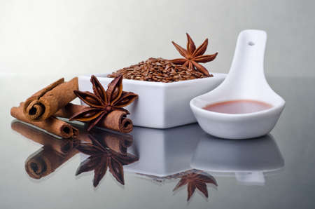 Star anise, cinnamon and flaxの写真素材
