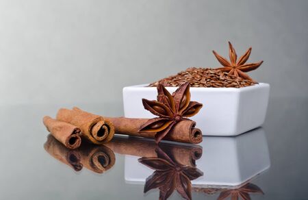 Star anise, cinnamon and flaxの写真素材