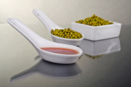 Mung beans in a ceramic bowl の写真素材