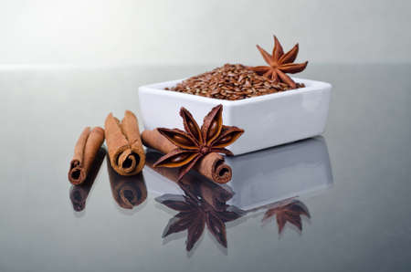 Star anise, cinnamon and flaxの写真素材