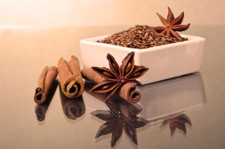 Star anise, cinnamon and flaxの写真素材