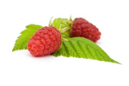 Fresh, ripe raspberries on whiteの写真素材