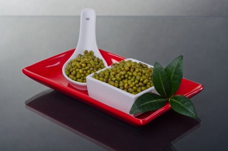 Mung beans in a ceramic bowl の写真素材