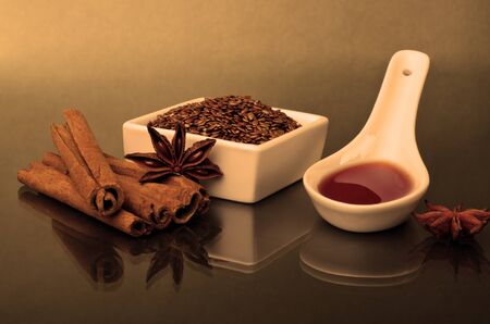 Star anise, cinnamon and flaxの写真素材