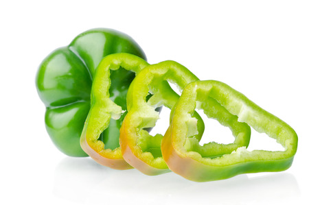 juicy sweet green pepper isolated on white backgroundの写真素材