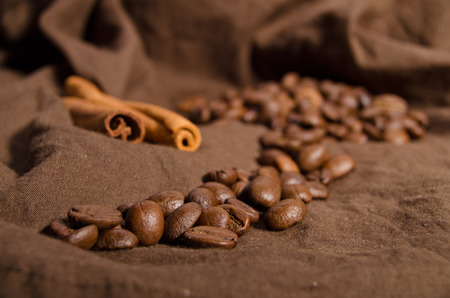 Coffee beans with cinnamon sticksの写真素材