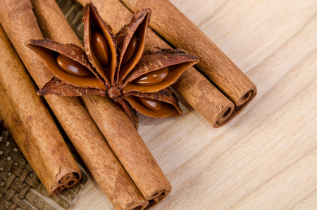 spices for mulled wine on wooden tableの写真素材