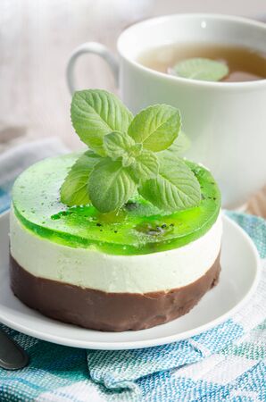 herbal tea with cake on wooden background.の写真素材