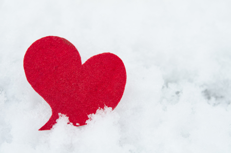 red heart on ice wet snow,  outdoors imageの写真素材