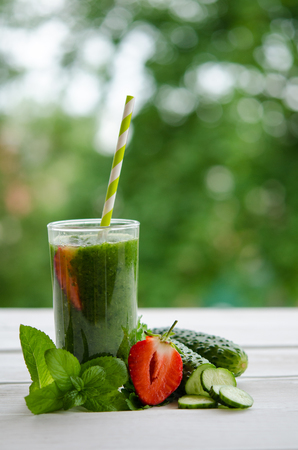 Green smoothie as healthy summer drinkの写真素材