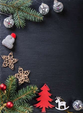Christmas decoration. Frame made of Christmas toys and empty space for text. Greeting card.の写真素材