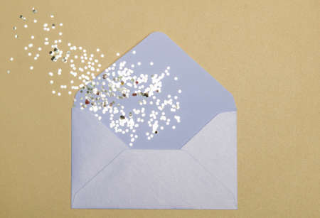 Christmas magic pollen from a white envelope. New year decoration.の写真素材
