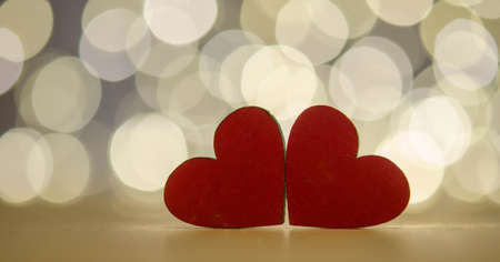 Red hearts, silvery bokeh and cheerful moodの写真素材