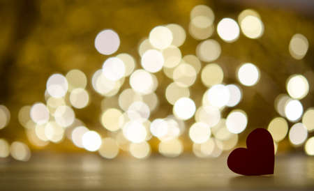 Red heart, silvery bokeh and Cheerful moodの写真素材