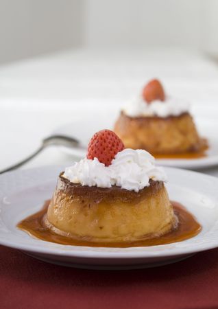 Caramel custard with cream and strawberryの写真素材