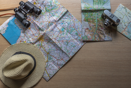 planning the holidays ,the trip with the old camera, binoculars and my favorite hatの写真素材
