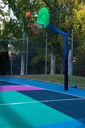 colored basketball court blue purple green orangeの写真素材