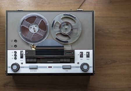 start of old tape recorder, play, pause, rewind, man playingの写真素材