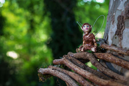 Selective Focus. Fairy figure in a real forest. Bureta, Zaragoza, Spain. Burobosque. Forest of elves and mythological and fantastic creatures.の写真素材