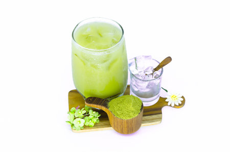 Green tea on wooden boards and green tea powder with wooden spoon.の写真素材