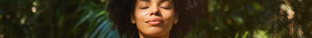 Beautiful african american woman with closed eyes in park, banner. Generative Ai.の素材