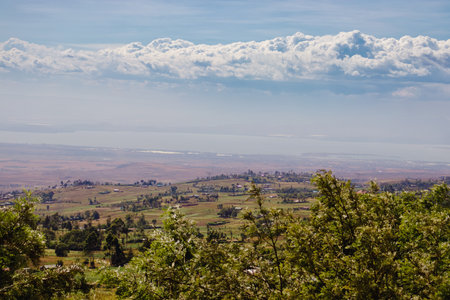 View from the top of the mountain on the valley and clouds.の写真素材