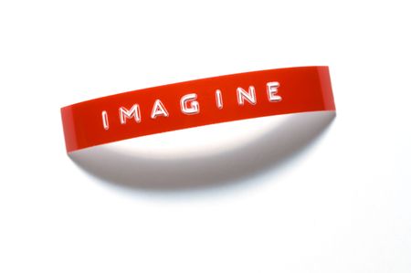 The word Imagine done with old-fashioned punch-style letteringの写真素材