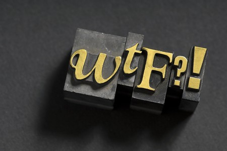 The acronym WTF done in old lead type.の写真素材