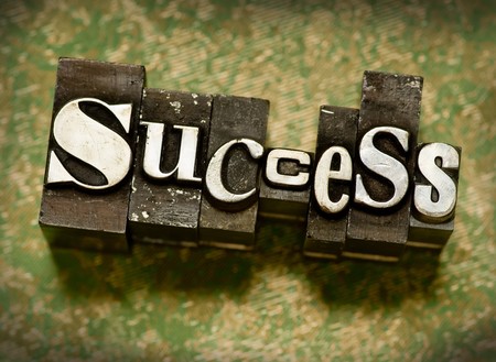 The word Success done in letterpress type