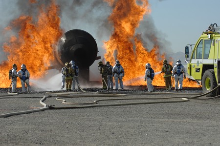 Firefighters train for battling an aircraft fire