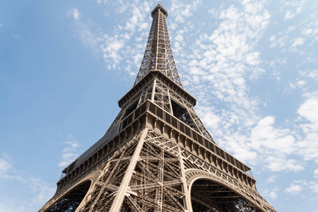 Looking up at the famous Eiffel Tower