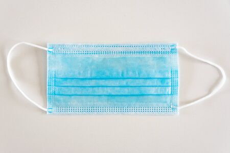 Disposable surgical face mask cover the mouth and nose.