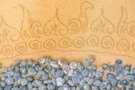 Pattern on clean sand. The concept of peace and contemplation. Flat lay topの写真素材